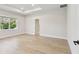 Bedroom with tray ceilings, and view to exterior at 3218 21St N St, St Petersburg, FL 33713