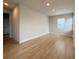 Bright bedroom featuring hardwood floors, a window, and neutral paint at 3218 21St N St, St Petersburg, FL 33713