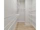 Walk-in closet with metal shelving at 3218 21St N St, St Petersburg, FL 33713