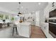 Stylish kitchen with white cabinetry, island and stainless steel appliances at 3218 21St N St, St Petersburg, FL 33713