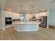 Spacious kitchen with white cabinets, large center island and stainless steel appliances at 3218 21St N St, St Petersburg, FL 33713