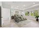 Spacious bedroom featuring tray ceilings, recessed lighting, and large windows for ample natural light at 3218 21St N St, St Petersburg, FL 33713
