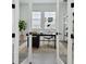 Stylish home office with contemporary desk, ample natural light, and minimalist decor, ideal for productivity at 3218 21St N St, St Petersburg, FL 33713
