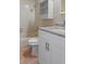 Bathroom featuring tiled shower and granite countertop vanity with storage at 1628 Baker Rd, Lutz, FL 33559