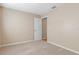 Neutral bedroom with carpet floors, window, closet and plenty of space at 1628 Baker Rd, Lutz, FL 33559