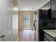 Modern kitchen featuring granite countertops and stainless steel appliances at 1628 Baker Rd, Lutz, FL 33559