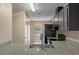 Kitchen featuring granite countertops and stainless steel sink at 1628 Baker Rd, Lutz, FL 33559