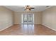 The spacious living room is bright and airy, perfect for entertaining guests or relaxing with Gathering at 1628 Baker Rd, Lutz, FL 33559