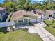Charming single-story home featuring a well-maintained lawn and driveway at 1742 Mississippi Ne Ave, St Petersburg, FL 33703