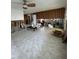 Spacious living room featuring tile floors and exposed framing at 1742 Mississippi Ne Ave, St Petersburg, FL 33703