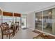 A sunroom with natural light offers an area to relax, with an easy transition to the bedroom or exterior at 1742 Mississippi Ne Ave, St Petersburg, FL 33703