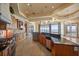 Spacious kitchen with stainless steel appliances, custom cabinetry, and a large island at 26 Sunset Bay Drive, Belleair, FL 33756