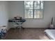 Bedroom with a window, carpet flooring, and room for personalization at 501 Knights Run Ave # 2119, Tampa, FL 33602