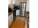 Functional kitchen with stainless steel appliances, granite countertops, and white cabinets at 501 Knights Run Ave # 2119, Tampa, FL 33602