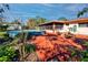 View of the backyard featuring an above-ground pool and an inviting patio area for outdoor relaxation at 6226 Hampton N Ct, St Petersburg, FL 33710