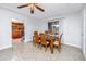 Open dining area next to the kitchen, featuring a wooden table and views of the pool area at 6226 Hampton N Ct, St Petersburg, FL 33710