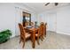 Cozy dining room featuring natural light and charming accents at 6226 Hampton N Ct, St Petersburg, FL 33710