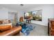 Bright living room with large window views and stylish decor at 6226 Hampton N Ct, St Petersburg, FL 33710