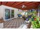Enclosed lanai featuring checkered flooring, patio furniture, and pool views at 6226 Hampton N Ct, St Petersburg, FL 33710
