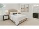 Clean bedroom with cream colored furniture and bright natural lighting at 4023 W Horatio St, Tampa, FL 33609