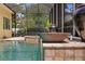 A fountain pours water into the pool area at 4023 W Horatio St, Tampa, FL 33609