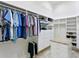 Organized walk-in closet featuring ample storage space, shelving, and custom organization systems at 4023 W Horatio St, Tampa, FL 33609