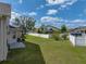 Backyard featuring green grass, a patio and perimeter fence at 4351 Highcroft Dr, Wesley Chapel, FL 33545