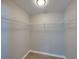 Walk-in closet with wire shelving and light-colored walls at 4351 Highcroft Dr, Wesley Chapel, FL 33545