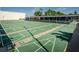 Community shuffleboard court with multiple lanes and shaded seating areas at 5975 Terrace Park N Dr # 102, St Petersburg, FL 33709