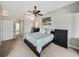 Spacious main bedroom with a comfortable bed, lots of natural light, and modern decor at 6307 Bridgevista Dr, Lithia, FL 33547