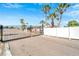 Gated entrance to a residential community with palm trees and well-maintained landscaping at 112 Saint Pierres Way, Apollo Beach, FL 33572