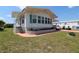 Charming single-story home with a well-maintained lawn, flower beds and carport at 112 Saint Pierres Way, Apollo Beach, FL 33572