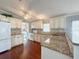Bright kitchen with modern appliances and lots of counter space at 112 Saint Pierres Way, Apollo Beach, FL 33572