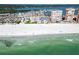 Expansive beach near waterfront condo buildings, offering pristine sands and clear ocean views for a relaxed coastal lifestyle at 17960 Gulf Blvd # 103, Redington Shores, FL 33708