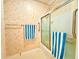 Cozy bathroom featuring a shower with glass door and updated fixtures and accessories at 2116 Nantucket Dr # 19, Sun City Center, FL 33573