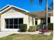Charming single-story home with a screened-in garage and well-maintained landscaping at 2116 Nantucket Dr # 19, Sun City Center, FL 33573