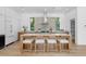 Modern kitchen with an island, stainless steel appliances, and hardwood floors at 2702 N Woodrow Ave # 2, Tampa, FL 33602