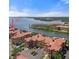 Aerial view of waterfront condo complex with private docks, easy access to the water at 2757 Via Cipriani # 1114A, Clearwater, FL 33764