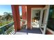 Inviting balcony leading to bedroom offering serene waterfront views at 2757 Via Cipriani # 1114A, Clearwater, FL 33764
