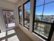 Balcony featuring black framed windows providing stunning waterfront views at 2757 Via Cipriani # 1114A, Clearwater, FL 33764