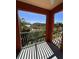 Scenic balcony featuring wrought iron railings with views of the waterfront and surrounding landscape at 2757 Via Cipriani # 1114A, Clearwater, FL 33764