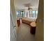 Light-filled bedroom with large windows, ceiling fan, and tiled flooring at 2757 Via Cipriani # 1114A, Clearwater, FL 33764