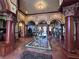 Stunning foyer with marble floors, grand columns, archways, and decorative accents create an opulent entrance at 2757 Via Cipriani # 1114A, Clearwater, FL 33764