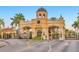 Elegant gated entrance to Bay Watch community with lush landscaping and meticulous design at 2757 Via Cipriani # 1114A, Clearwater, FL 33764