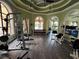 Community gym featuring various weight machines, free weights, and plenty of room for a full workout at 2757 Via Cipriani # 1114A, Clearwater, FL 33764