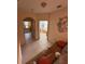 Hallway with multiple doorways leading to bedrooms and living spaces at 2757 Via Cipriani # 1114A, Clearwater, FL 33764