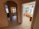 Upstairs hallway with views into multiple rooms at 2757 Via Cipriani # 1114A, Clearwater, FL 33764