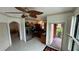 Open kitchen with stainless steel appliances, dark countertops, and ample cabinet space at 2757 Via Cipriani # 1114A, Clearwater, FL 33764