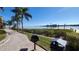 Scenic waterfront featuring walking path, docks, benches, and BBQ with stunning views and calming sounds at 2757 Via Cipriani # 1114A, Clearwater, FL 33764