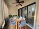 Covered patio with dining table and seating, perfect for outdoor dining and relaxation at 3985 Mermoor Dr, Palm Harbor, FL 34685